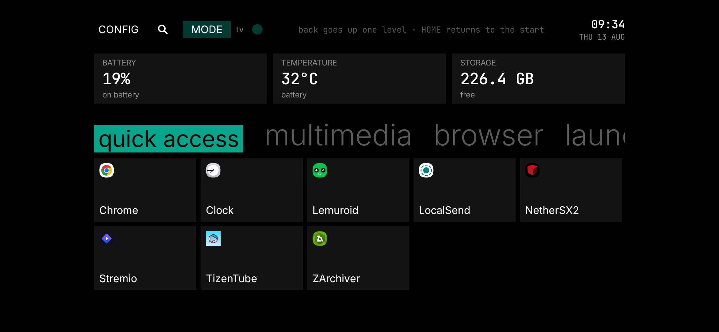 Revya TV on the big screen: top bar with settings, search and mode toggle; battery, temperature and storage cards; and the Emulators, Tools and Others sections with apps in a grid.